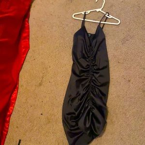 Sleek silk black fitted mini dress